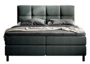 Boxbett in Frontansicht mit grauem Kopfteil und Bettwäsche in verschiedenen Grautönen