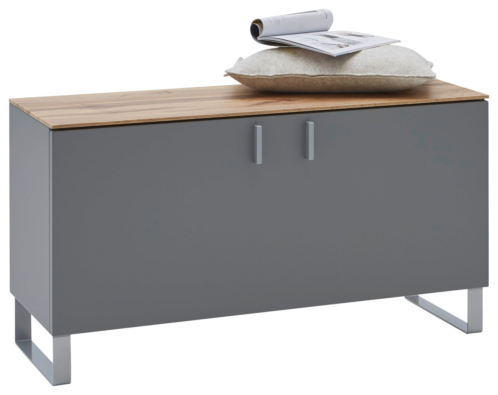 Dieter Knoll Garderobenbank CORTINA Garderobenbank in modernem Design mit grauer Front und Holzoberfläche, darauf ein Kissen und eine Zeitschrift, Perspektive von vorne.