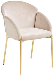 Eleganter Sessel mit beigem Samtbezug und goldenen Metallbeinen, seitliche Perspektive