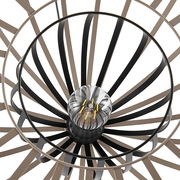 Nahaufnahme einer modernen Stehleuchte mit einem dekorativen, radialen Design aus schwarzen und bronzefarbenen Streben, von oben betrachtet.