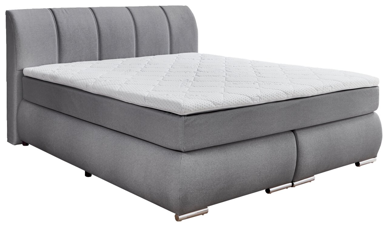 Graues Boxspringbett mit gestepptem Kopfteil, seitliche Perspektive