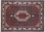 Orientteppich mit komplexem geometrischem Muster in Rot- und Blautönen, Draufsicht