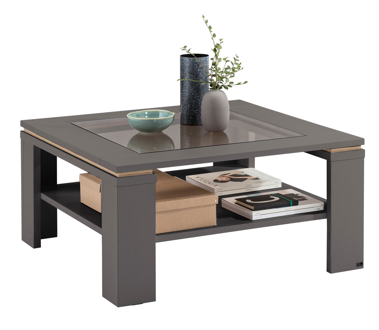 Set one by Musterring Couchtisch SET ONE TACOMA Moderner Couchtisch in dunklem Grau mit Glasplatte, dekoriert mit Vasen und Schalen, seitliche Perspektive