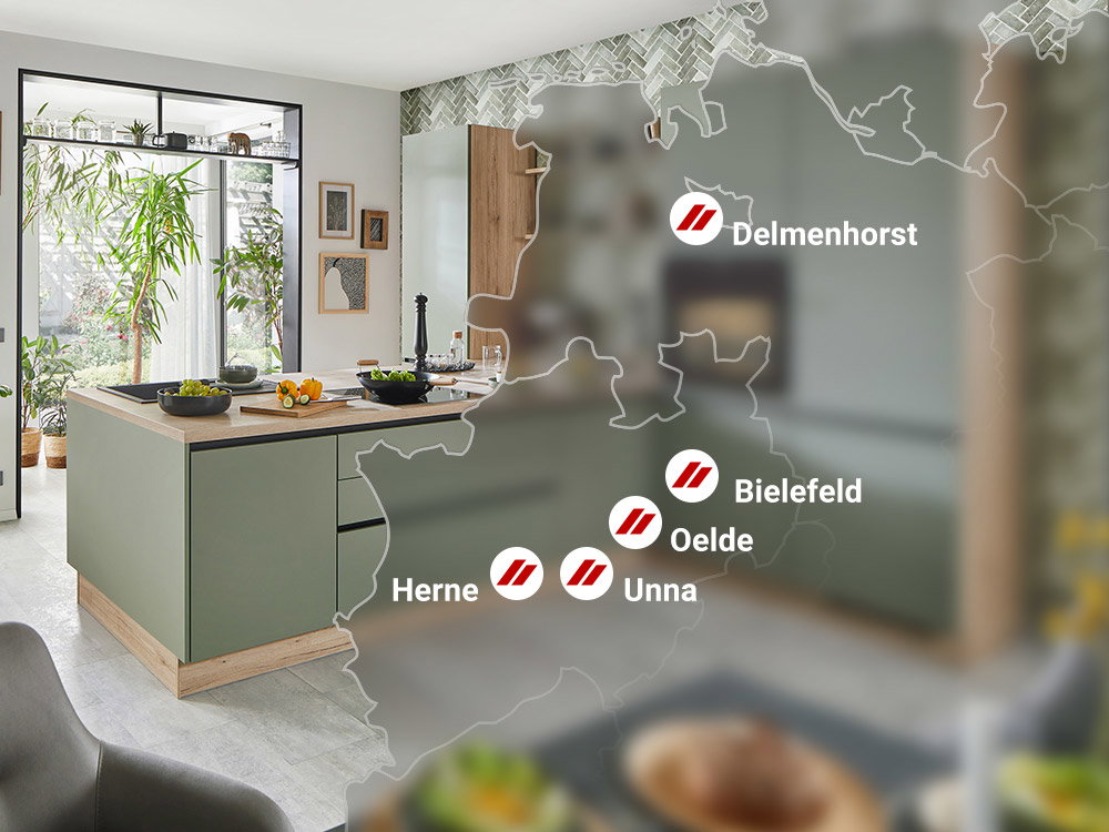 Deutschlandkarte mit Standorten in Delmenhorst, Bielefeld, Herne, Oelde und Unna vor moderner Küche.