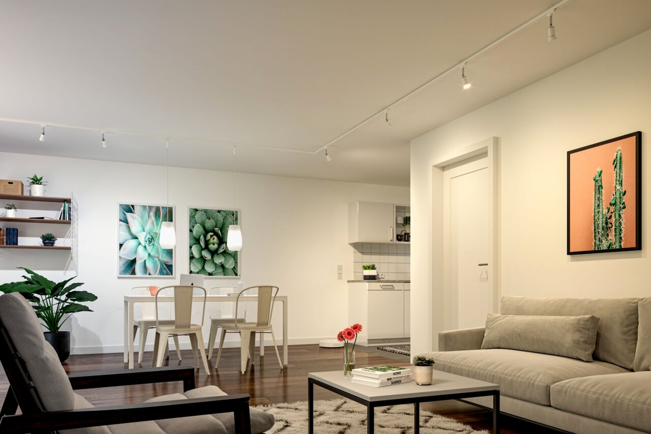 Moderne Wohnzimmeransicht mit LED-Leuchtmittel auf URail-Schiene an der Decke, helle und gemütliche Einrichtung.