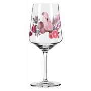 Weinglas mit tropischem Design, Papagei und Früchten, seitliche Perspektive