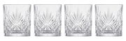 Vier Whiskygläser mit elegantem Schliffmuster, frontal fotografiert.