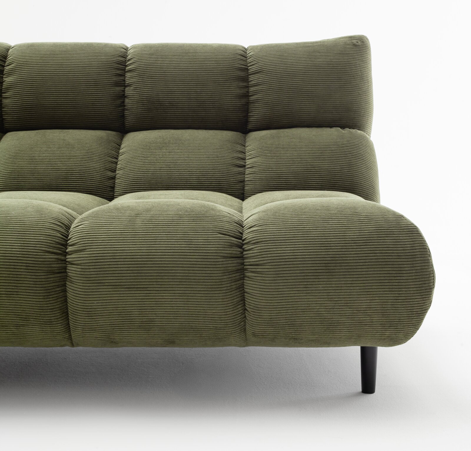 Groene hoekbank met geribbelde stoffen bekleding, zijaanzicht