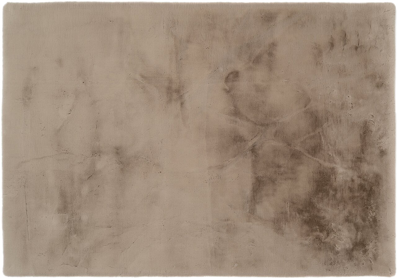 Beiger Fellteppich in Draufsicht mit weicher, samtiger Textur