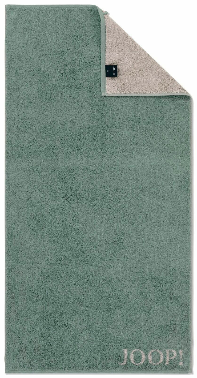 JOOP! Duschtuch DOUBLEFACE Grünes Duschtuch mit beiger Rückseite und JOOP!-Logo in der unteren rechten Ecke, aus der Vogelperspektive fotografiert.