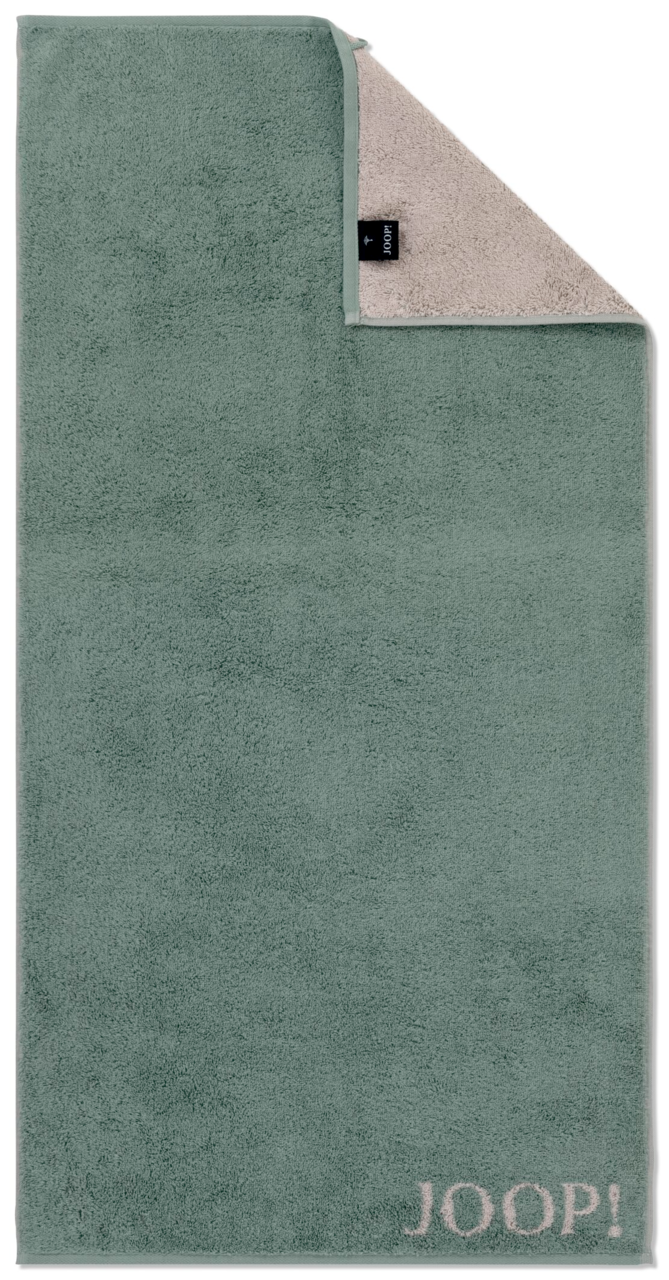 JOOP! Duschtuch DOUBLEFACE Grünes Duschtuch mit beiger Rückseite und JOOP!-Logo in der unteren rechten Ecke, aus der Vogelperspektive fotografiert.