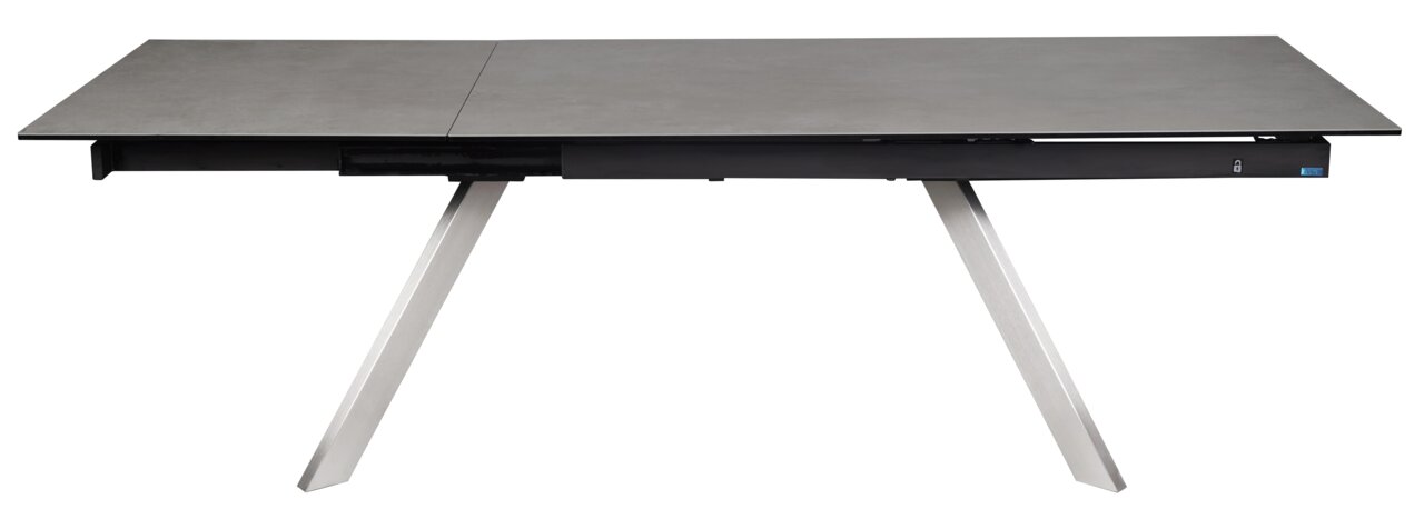 Moderner Esstisch mit grauer Tischplatte und schrägen Metallbeinen, Seitenansicht