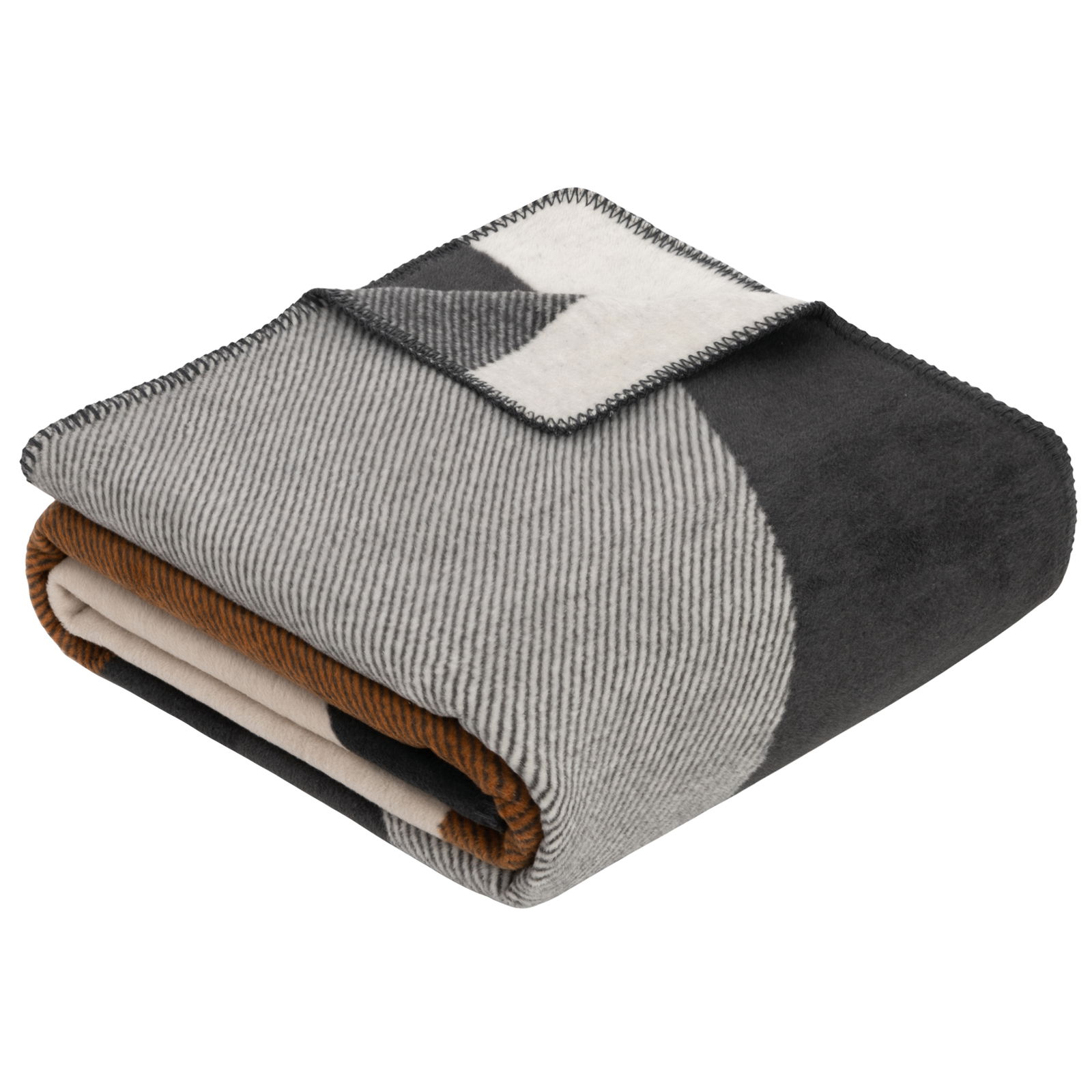 Gefaltete Jacquard Decke in Grautönen mit geometrischem Muster, seitliche Perspektive