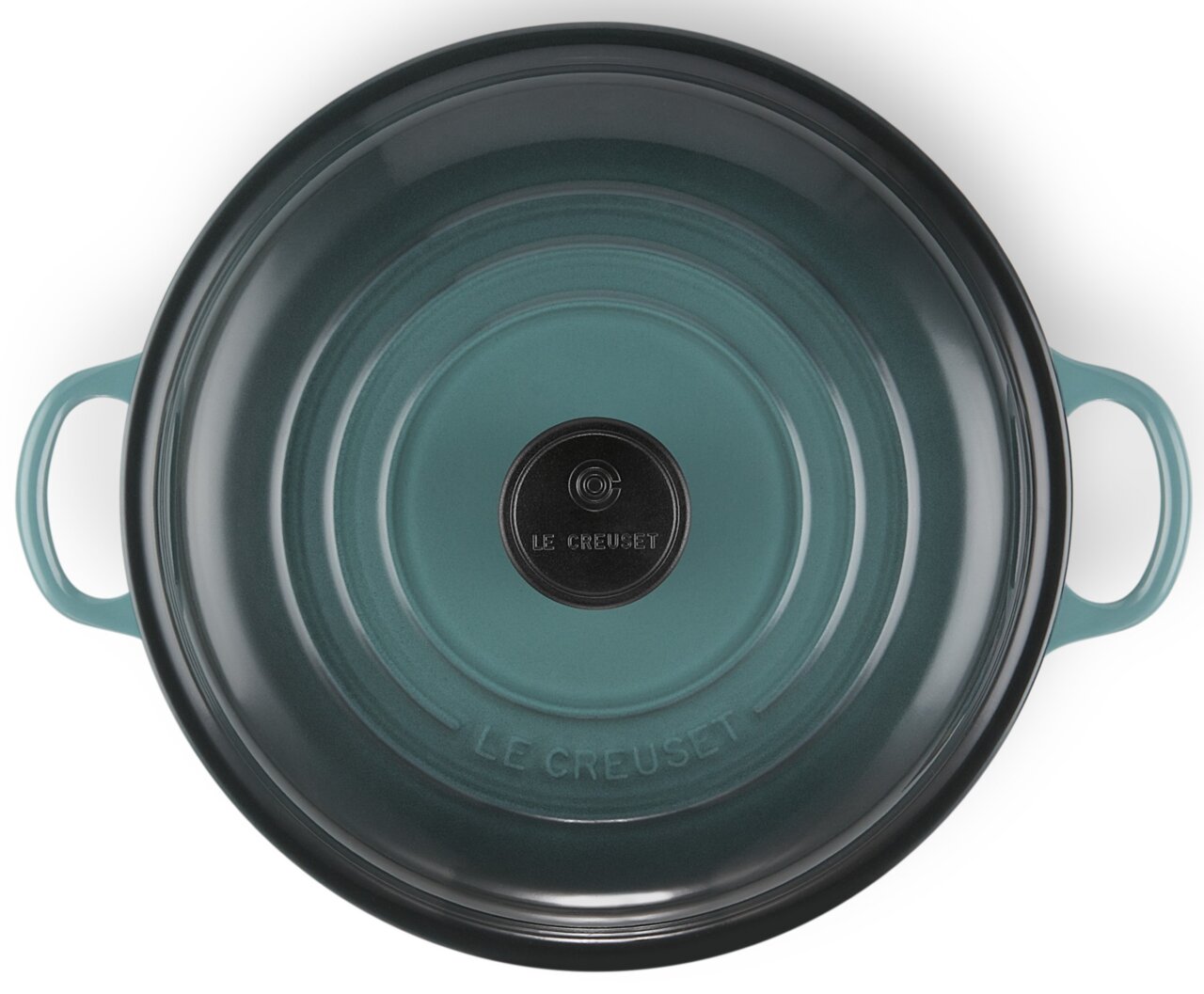 Obere Ansicht einer runden, türkisfarbenen Servierpfanne mit zwei Griffen und einem schwarzen Knauf auf dem Deckel.