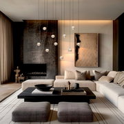 Moderne LED-Pendelleuchte in einem stilvollen Wohnzimmer, von unten betrachtet, mit mehreren hängenden Leuchtkörpern über einem eleganten Couchtisch.