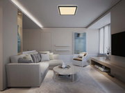 Moderne Deckenleuchte aus Kunststoff in einem stilvollen Wohnzimmer, von unten betrachtet.