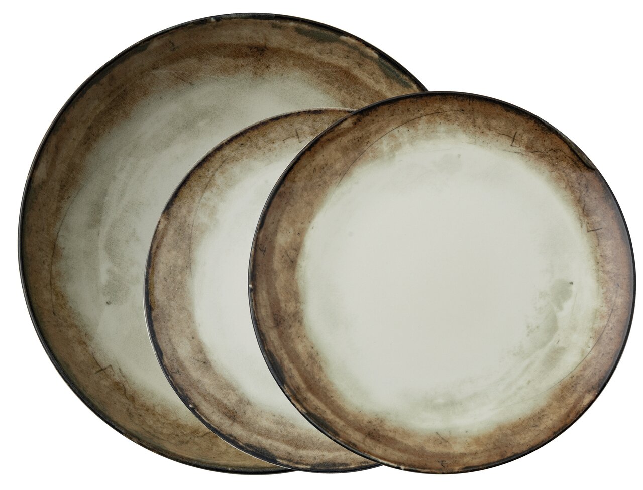 Driedelige bordenset Shade Earth in aardetinten, gefotografeerd van bovenaf.