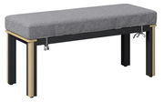 Bank mit grauem Polster und schwarzem Gestell, seitliche Perspektive