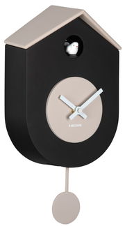 Moderne Wanduhr in Form eines Vogelhauses mit schwarzem Gehäuse und beigem Zifferblatt, seitliche Perspektive.