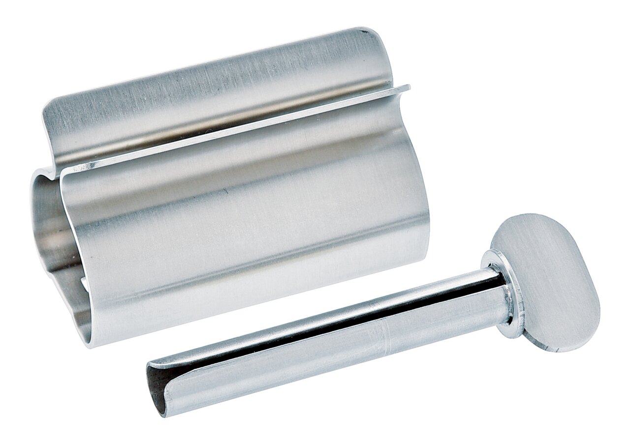 Metallischer Tubenausdrücker in seitlicher Perspektive, bestehend aus einem zylindrischen Körper und einem Hebel.