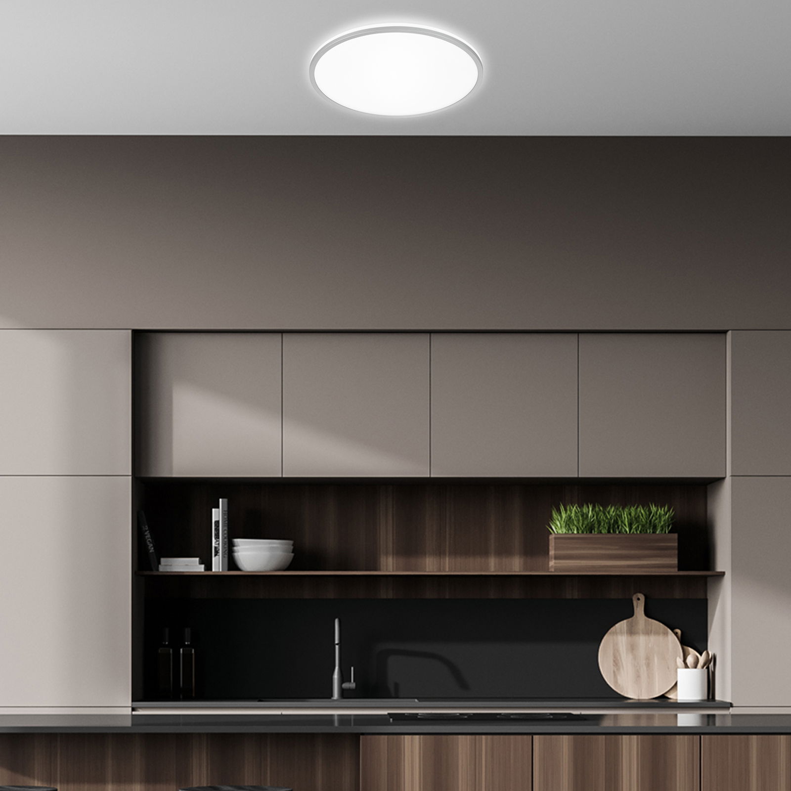 Briloner LED-Deckenleuchte PULAP A Moderne LED-Deckenleuchte in einer stilvollen Küche, von unten betrachtet.