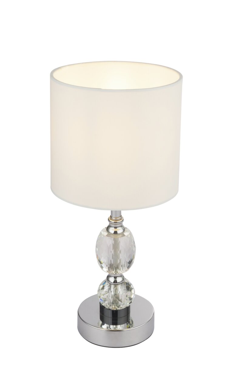 Elegante Tischleuchte aus Chrom mit weißem Lampenschirm und kristallklarem Sockel, frontal betrachtet.