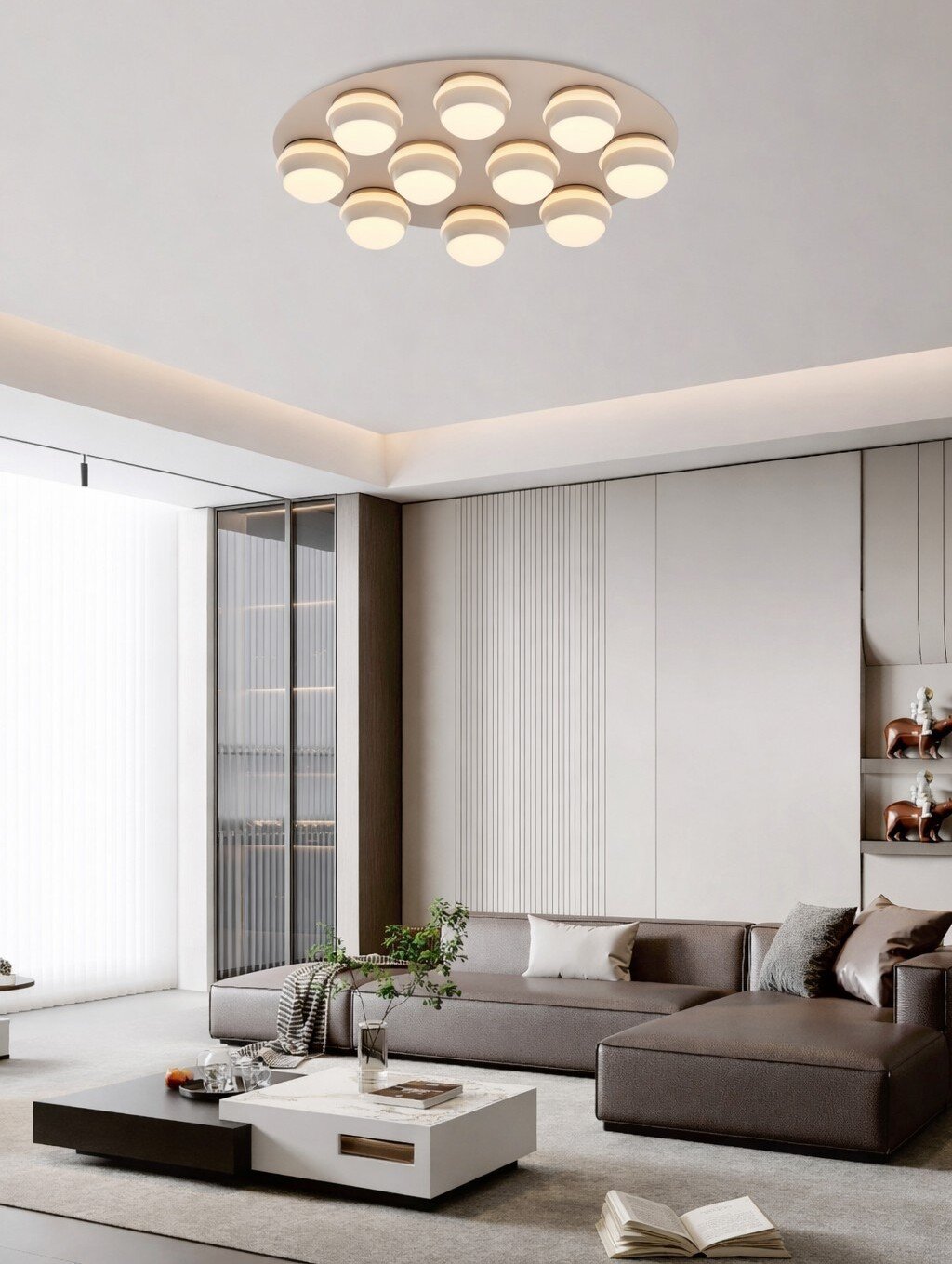 Moderne led-plafondlamp met meerdere ronde lichtelementen, van onderaf gezien in een stijlvolle woonkamer.