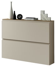 Moderner Hängeschuhschrank in Beige mit zwei Schubladen, dekoriert mit Vasen und Büchern, seitliche Perspektive.