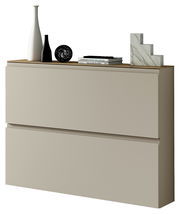 Moderner Hängeschuhschrank in Beige mit zwei Schubladen, dekoriert mit Vasen und Büchern, seitliche Perspektive.