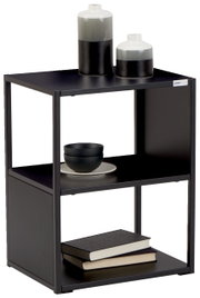 Moderne bijzettafel van zwart metaal met twee planken, versierd met keramische vazen, schalen en boeken, zijaanzicht