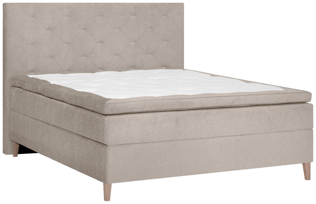 Beiges Boxspringbett mit gestepptem Kopfteil, seitliche Perspektive