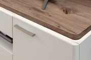 Nahaufnahme einer modernen weißen Kommode mit Holzoberfläche und LED-Beleuchtung, seitliche Perspektive.