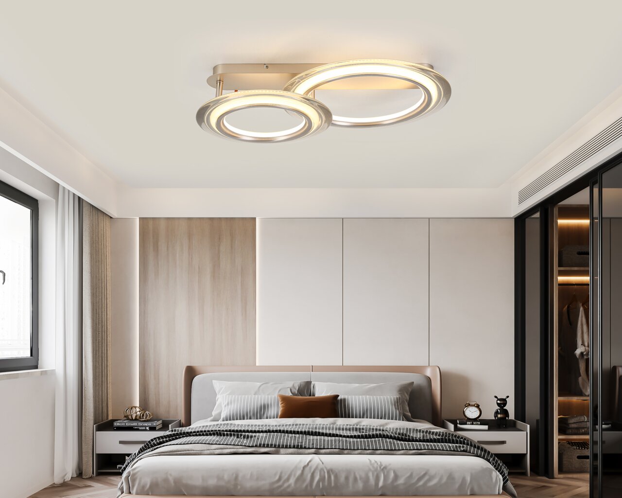 Moderne LED-Deckenleuchte mit zwei runden Leuchtringen, installiert in einem stilvollen Schlafzimmer, Perspektive von unten.