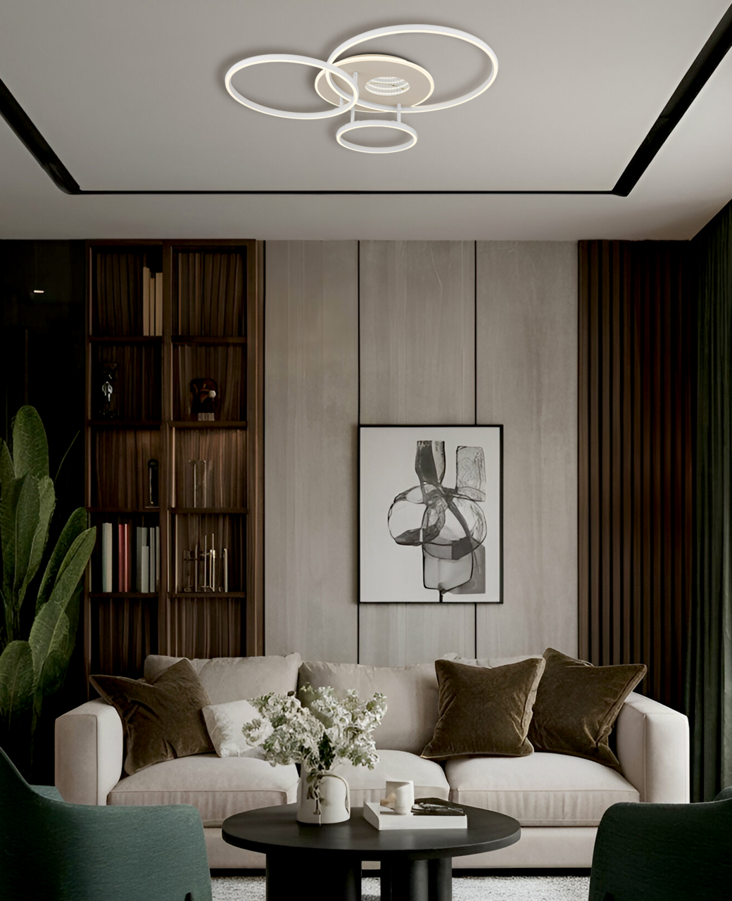 Moderne LED-Deckenleuchte mit kreisförmigem Design, von unten betrachtet in einem stilvollen Wohnzimmer mit Sofa und Kunstwerk an der Wand.