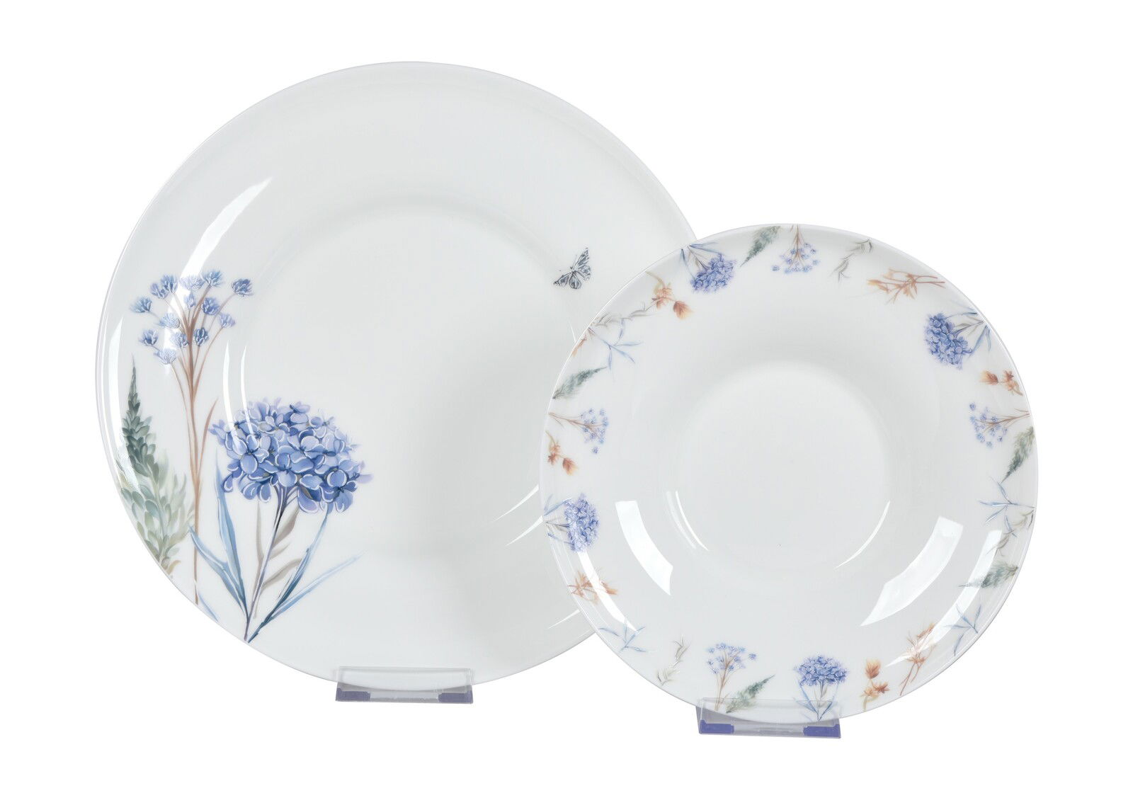Zwei weiße Teller mit blauen und grünen Blumenmustern, frontal fotografiert.