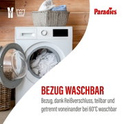 Frontansicht einer geöffneten Waschmaschine mit weißer Wäsche; Hinweis auf waschbaren Bezug mit Reißverschluss, bei 60°C waschbar (Paradies).