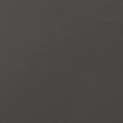 Nahaufnahme einer dunkelgrauen Oberfläche, möglicherweise ein Möbelstück oder eine Schranktür.