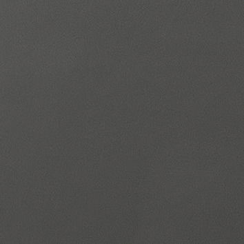 Nahaufnahme einer dunkelgrauen Oberfläche, möglicherweise ein Möbelstück oder eine Schranktür.