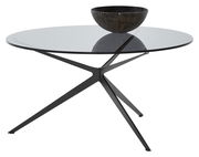 Moderner Couchtisch mit runder Glasplatte und schwarzem Metallgestell, seitliche Perspektive