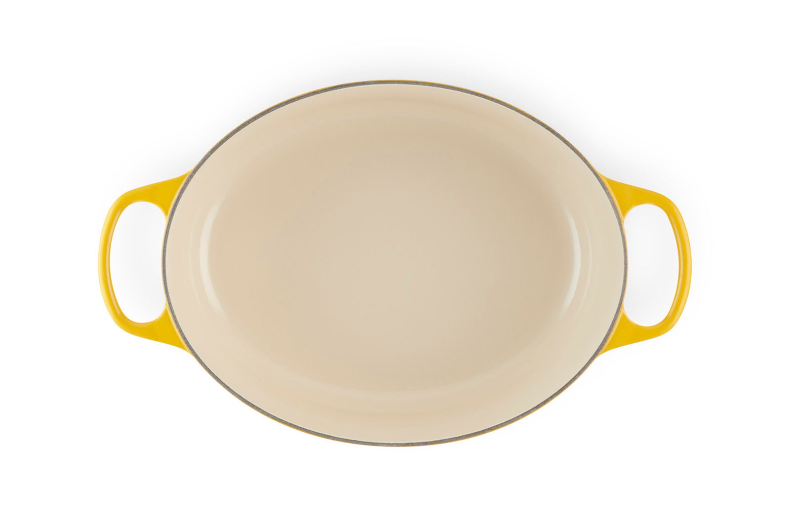 Vogelperspektive auf einen ovalen Bräter in der Farbe Nectar mit gelben Griffen.