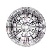 Ansicht von oben auf ein kunstvoll geschliffenes Glas mit strahlenförmigem Muster.