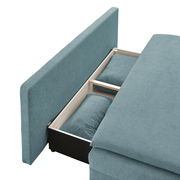 Funktionssofa in blauer Farbe mit geöffneter Stauraumfunktion, seitliche Perspektive