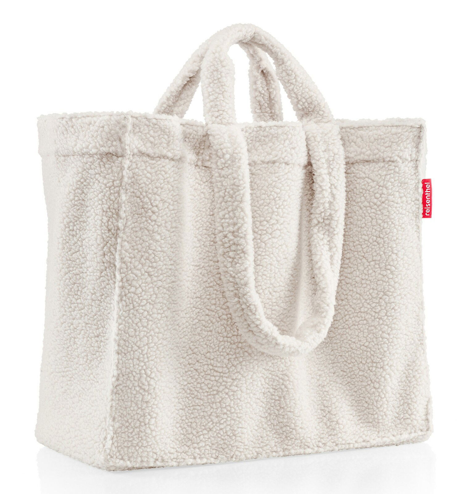 Weißer Shopper aus weichem, flauschigem Material mit zwei Griffen, seitliche Perspektive