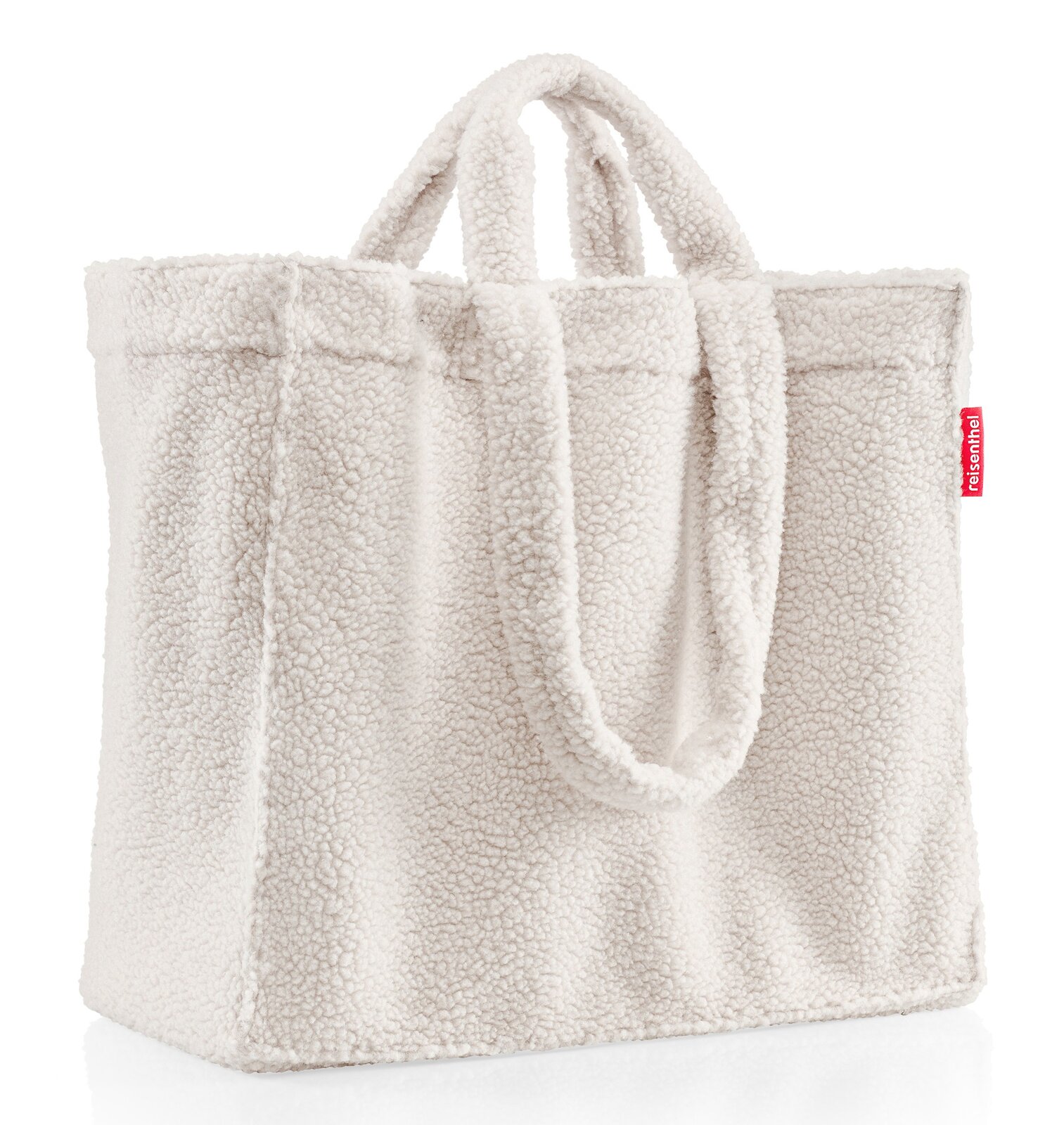 Weißer Shopper aus weichem, flauschigem Material mit zwei Griffen, seitliche Perspektive