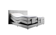 Graues Boxspringbett mit verstellbaren Matratzen, seitliche Perspektive