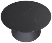 Runder Couchtisch mit schwarzer Marmoroptik, Ansicht von oben.