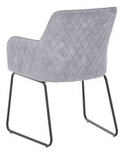 Rückansicht eines grauen Kufenstuhls mit gestepptem Stoffbezug und schwarzem Metallgestell.