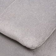 Nahaufnahme eines grauen, strukturierten Stoffes eines Boxspring-Funktionssofas, perspektivisch von oben fotografiert.