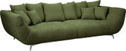 Groene stoffen 3-zitsbank met veel losse kussens en slanke metalen poten, schuin van voren links gefotografeerd.