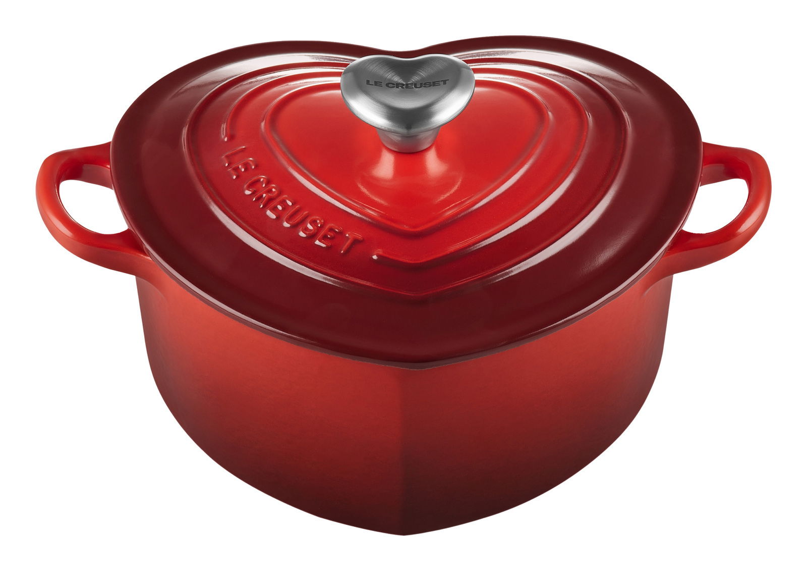 Roter herzförmiger Bräter mit Deckel und zwei Griffen, von oben betrachtet.